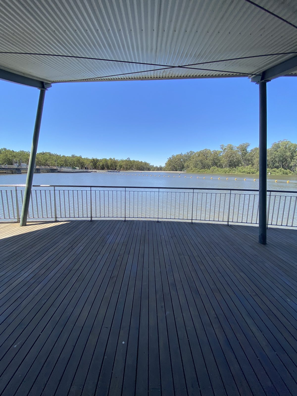 Covered timber viewing deck looking out over the murray river at Torrumbarry Weir Holiday Park