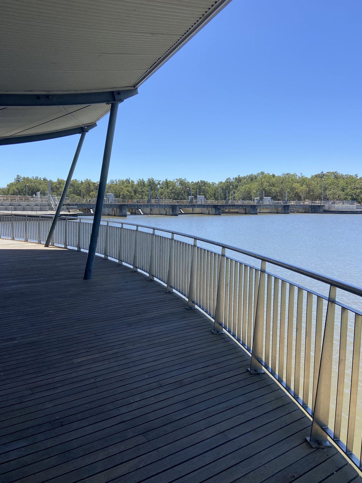 Lookout boardwalk with the weir wall in the distance at Torrumbarry Weir Holiday Park