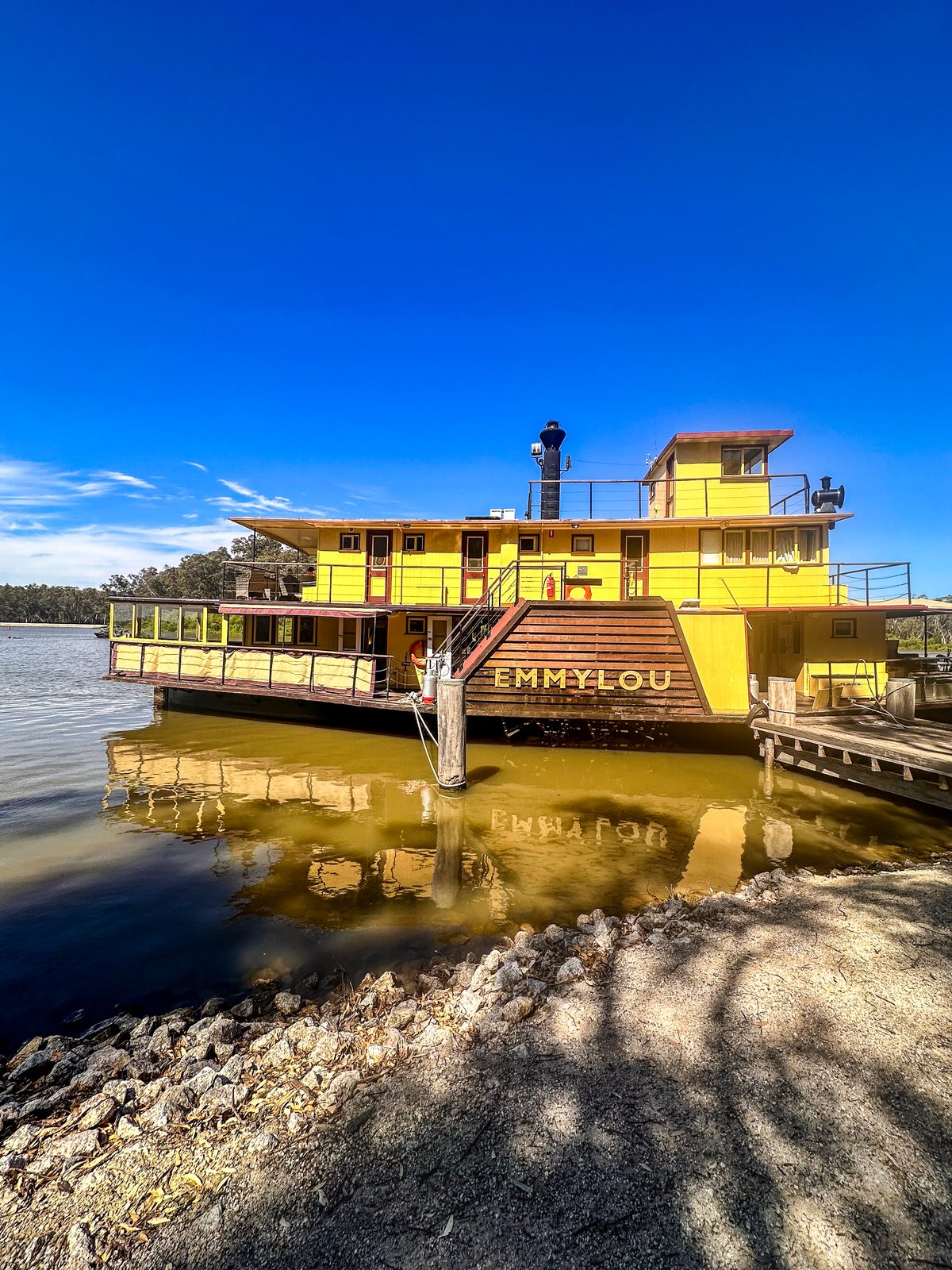 Paddlesteamer emmylou mirrored in the still murray river at Torrumbarry Weir Holiday Park