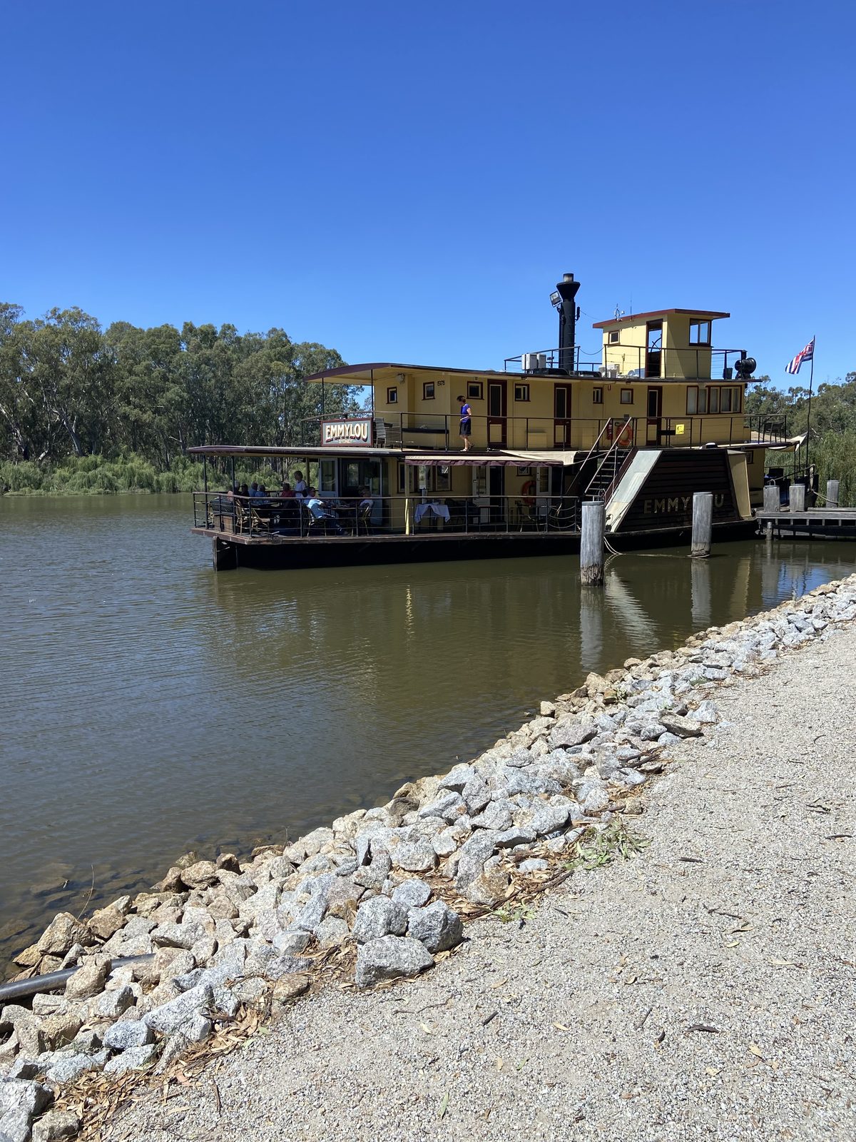Emmylou paddlesteamer moored on the Murray River, seen from the boat ramp at Torrumbarry Weir Holiday Park, Patho VIC