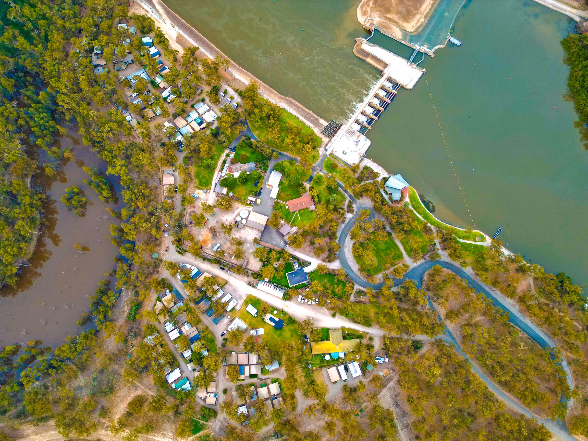Aerial of the park beside the murray river and weir at Torrumbarry Weir Holiday Park